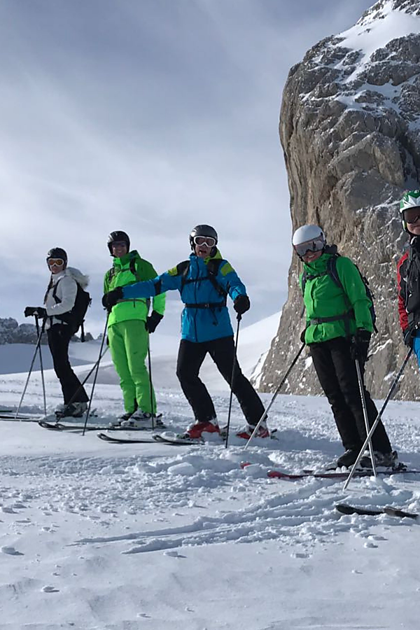Guided ski touring group in alpine terrain near Flachau