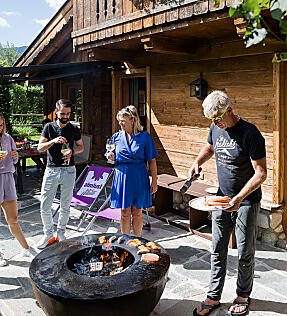 Cosy chalet evening at almlust with private terrace and laid table
