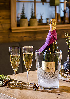 Sparkling wine in the private spa at almlust in Flachau for special wellness moments